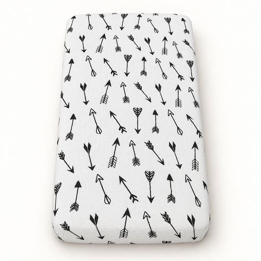 Arrows organic crib sheet with the full black and white print visible