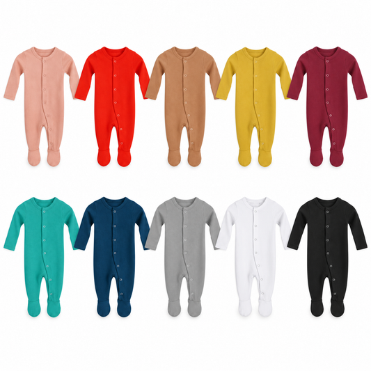Ten organic button footies at matching scale on white: Blooming Dahlia, Cherry Tomato, Ginger, Mustard, Maroon, Arcadia, Sailor Blue, Neutral Gray, White and Black.