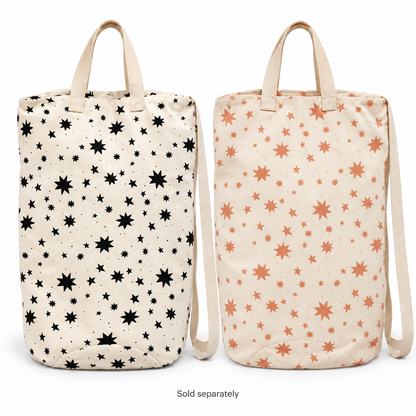 Black Starburst and Sunburn Starburst canvas laundry and gift bags on white. Sold separately.