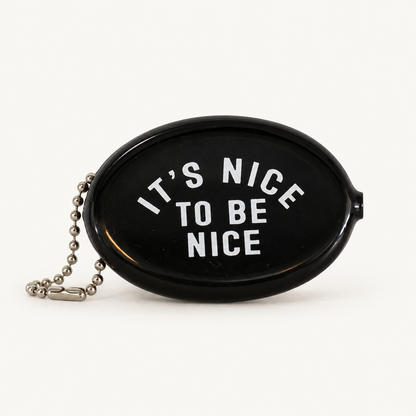 Black coin pouch with It's Nice to Be Nice message, front view