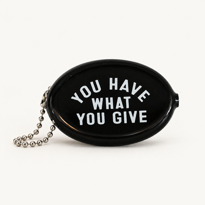 Black coin pouch with You Have What You Give message, front view
