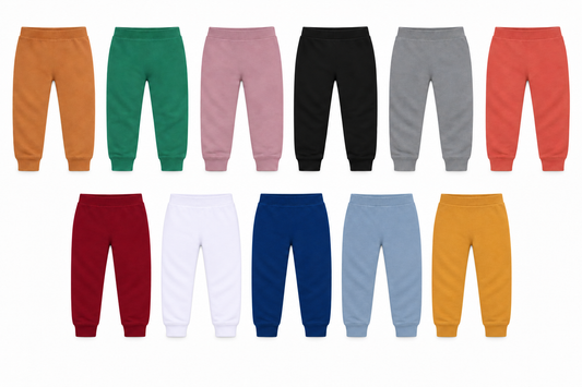 Organic Cozy Pants in all eleven solid colors, equally scaled front flat lays on white.