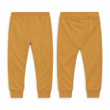Organic Cozy Pants in Honey, front and back views showing the curved rear seat panel on white.