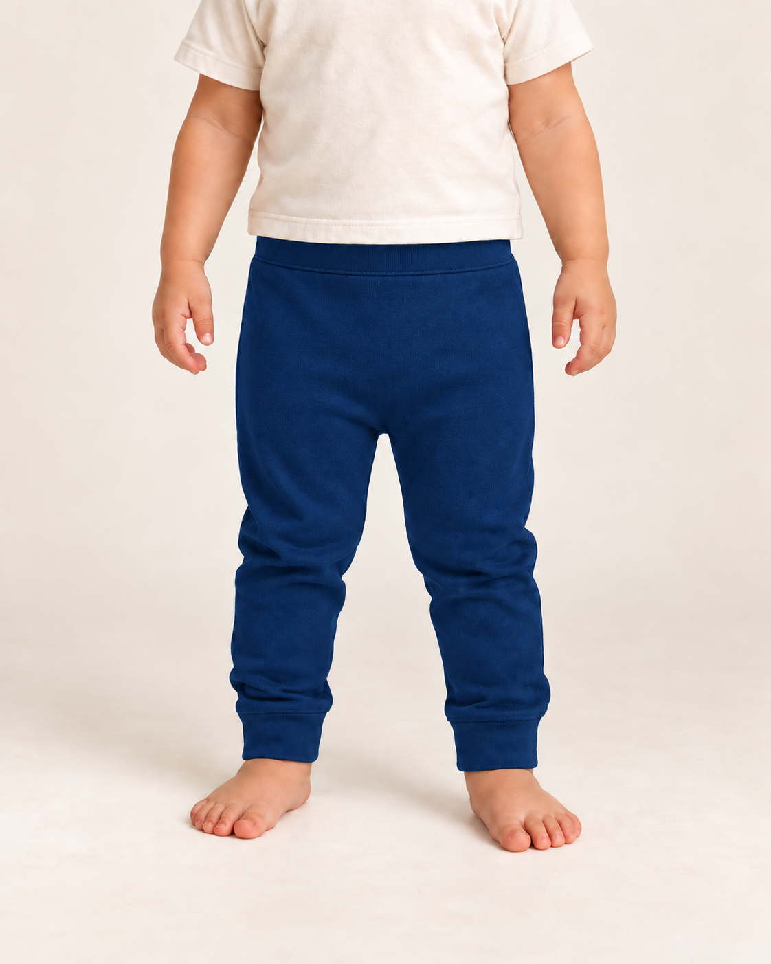 Cozy Pants in navy peony, on-child front view