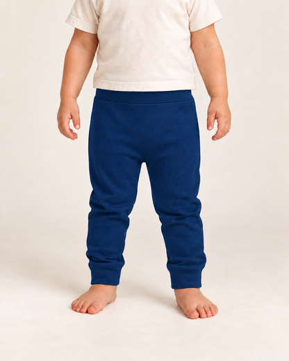 Cozy Pants in navy peony, on-child front view