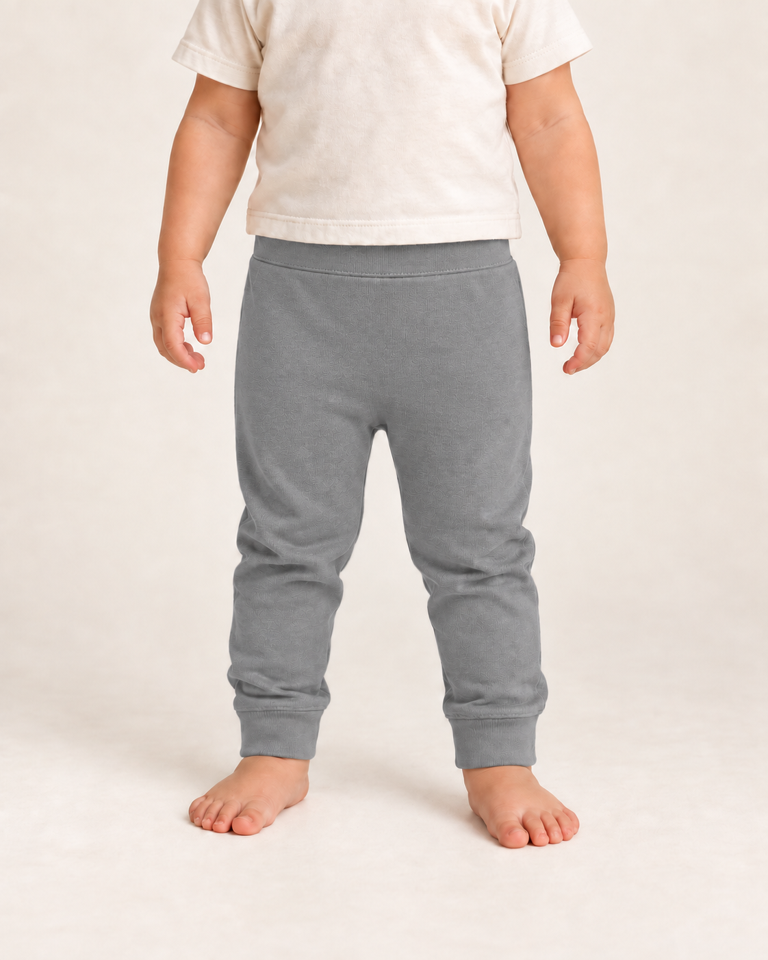 Cozy Pants in neutral gray, on-child front view