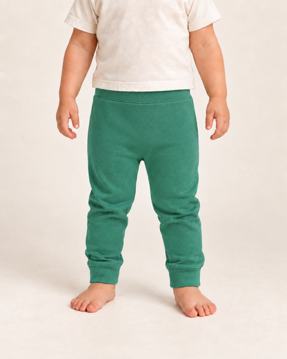 Cozy Pants in pine green, on-child front view