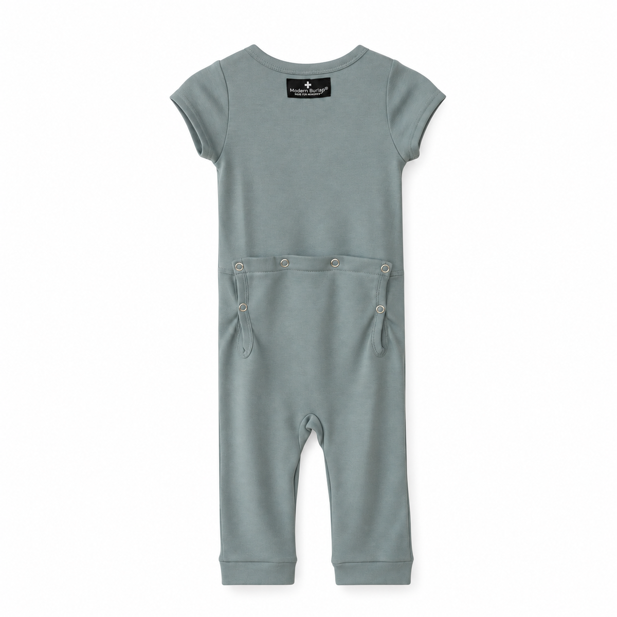 Modern Burlap organic short sleeve Explorer Back jumpsuit in Tradewinds, back studio view with snap opening