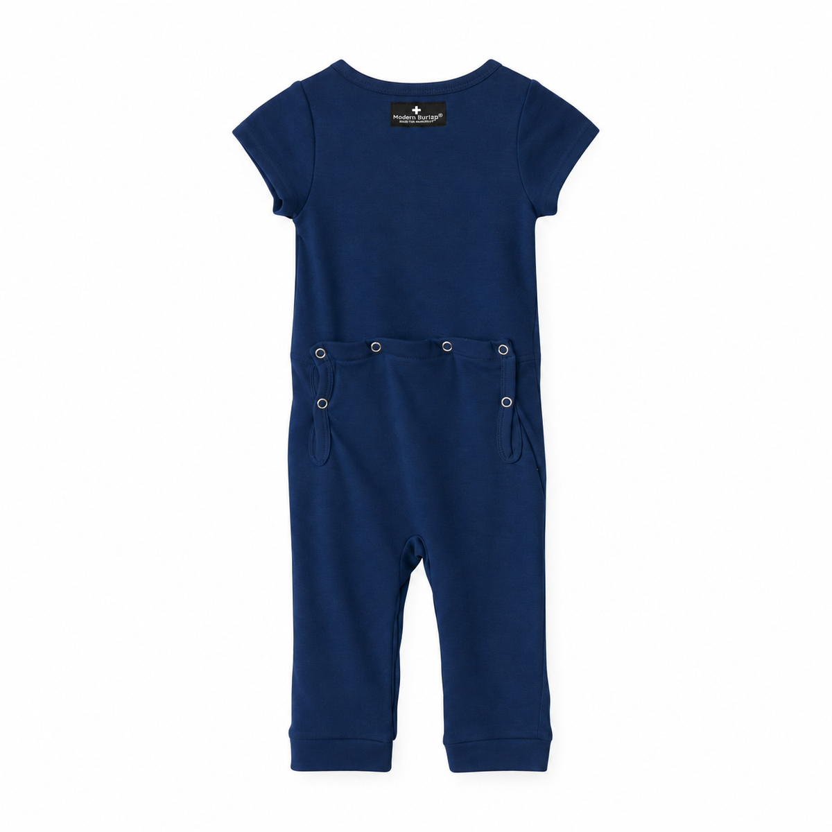 Modern Burlap organic short sleeve Explorer Back jumpsuit in Navy Peony, back studio view with snap opening