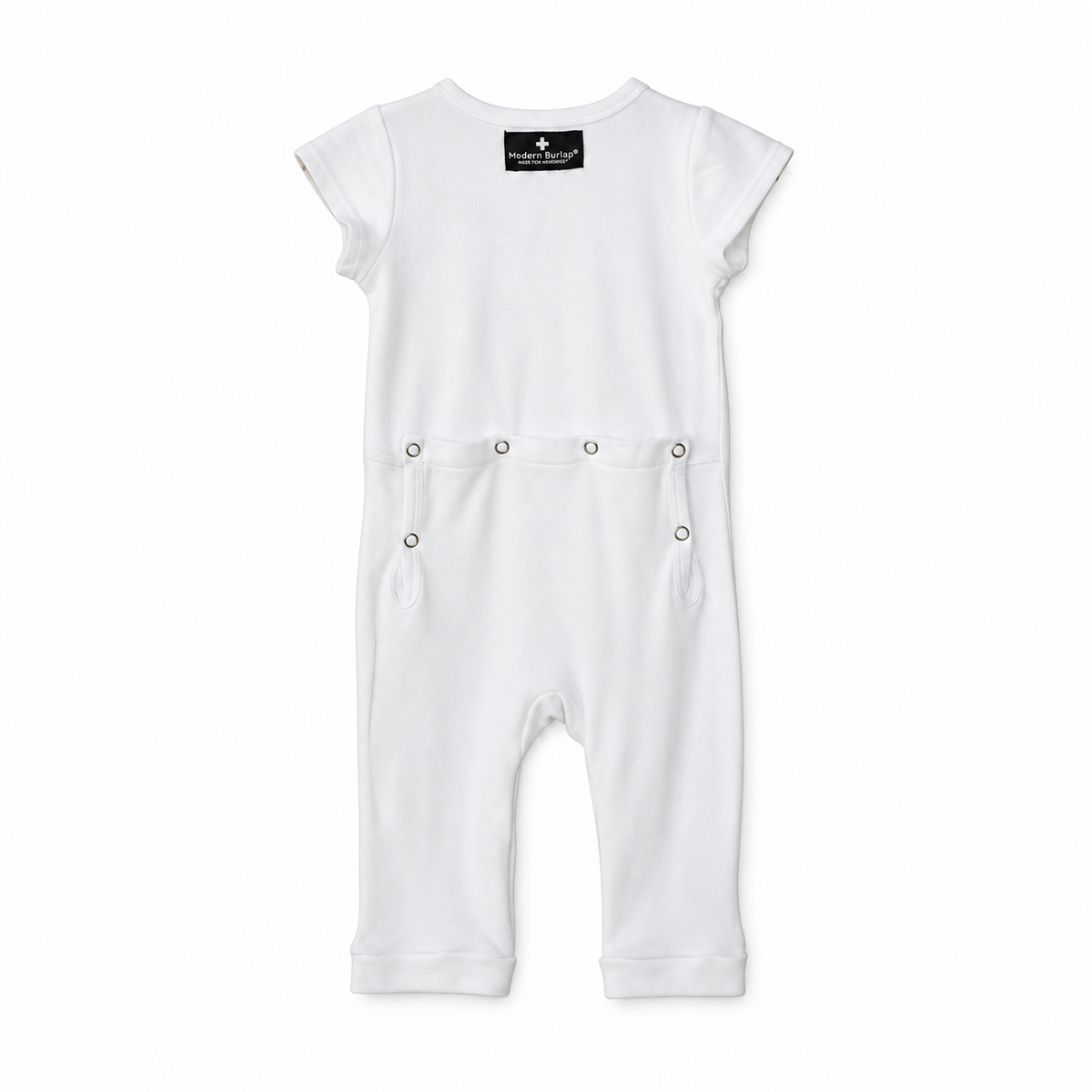 Modern Burlap organic short sleeve Explorer Back jumpsuit in White, back studio view with snap opening