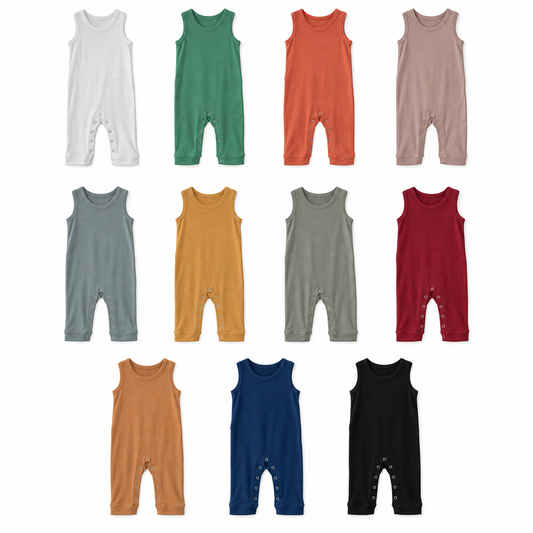 Eleven solid Explorer Back jumpsuit colors shown at matching scale on white: White, Pine Green, Aragon, Mauve, Tradewinds, Honey, Neutral Gray, Maroon, Ginger, Navy Peony and Black.