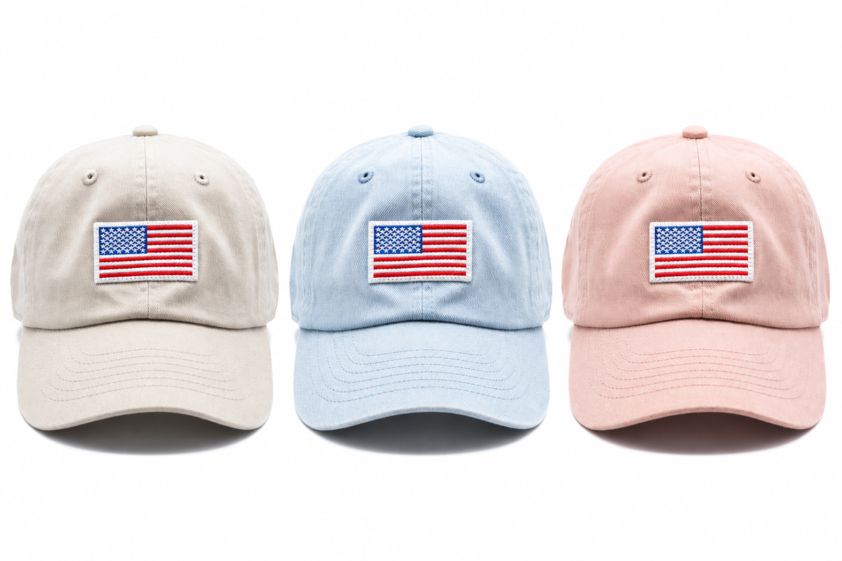 Rey to Z adult flag baseball hats in Dune, Super Light Denim and Dusty Rose at matching scale; hats sold individually.