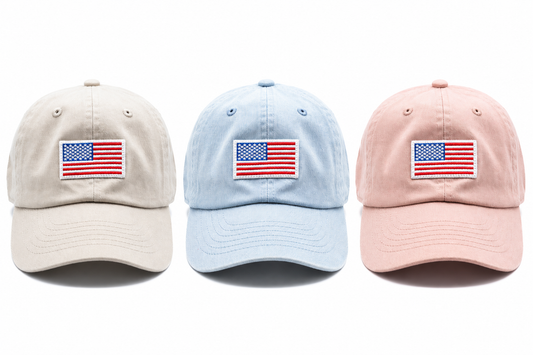 Rey to Z adult flag baseball hats in Dune, Super Light Denim and Dusty Rose at matching scale; hats sold individually.