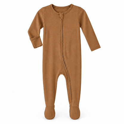 Ginger organic zip footie on white, with one sleeve turned to show the underside fold-over hand cover.