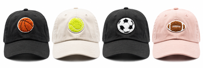 Four Rey to Z Terry Sports hats at matching display scale, left to right: Black Basketball, Dune Tennis, Black Soccer and Dusty Rose Football. Hats sold individually.