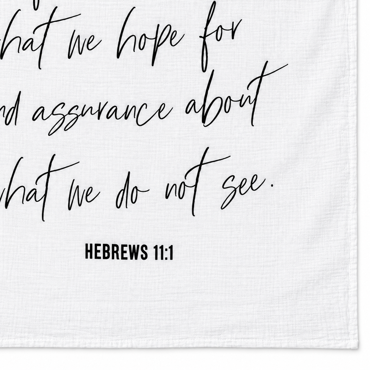 Hebrews 11:1 Scripture swaddle detail showing the printed lettering and hem.