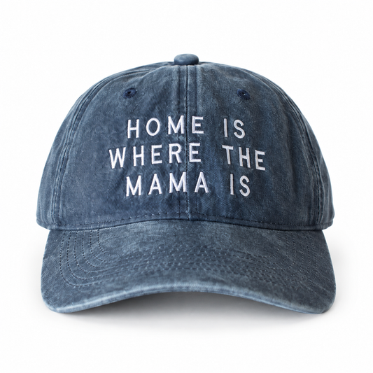 Washed blue adult Home Is Where the Mama Is cap with white embroidery, front view.