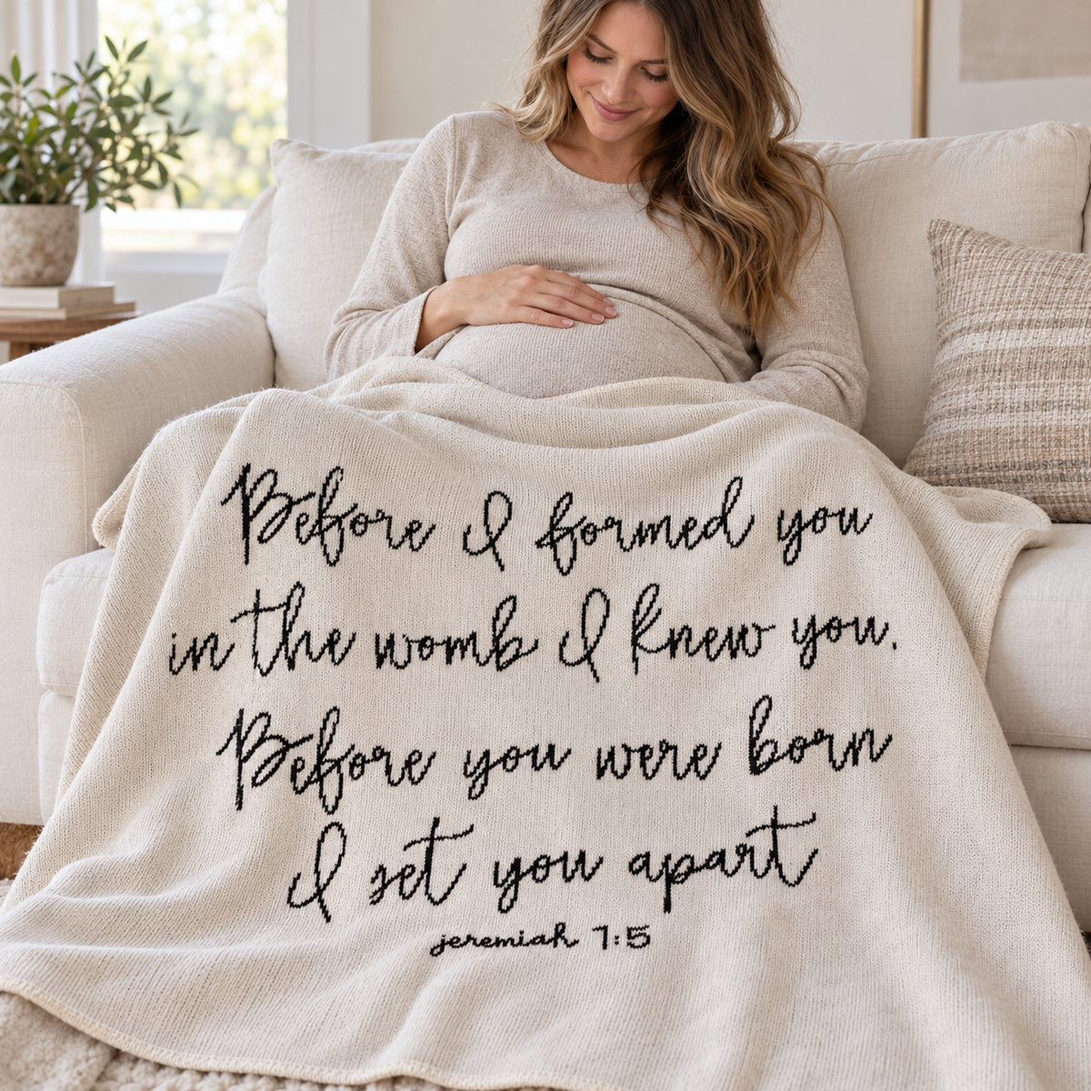 Expectant mother with a Natural Jeremiah 1:5 Classic knit throw.