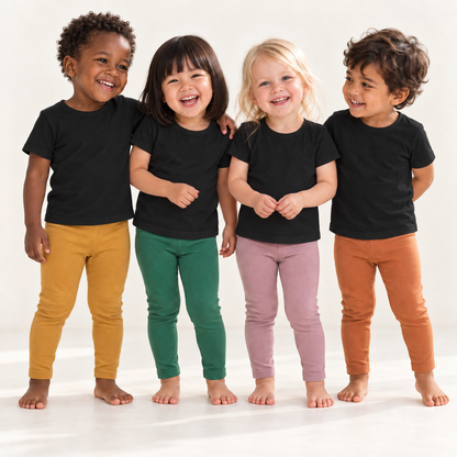 Four toddlers wearing solid leggings styled with Modern Burlap black basic tees