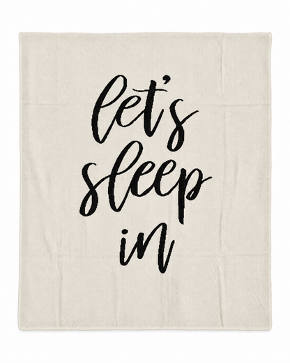 Let's Sleep In knit blanket in Natural, full design on white.