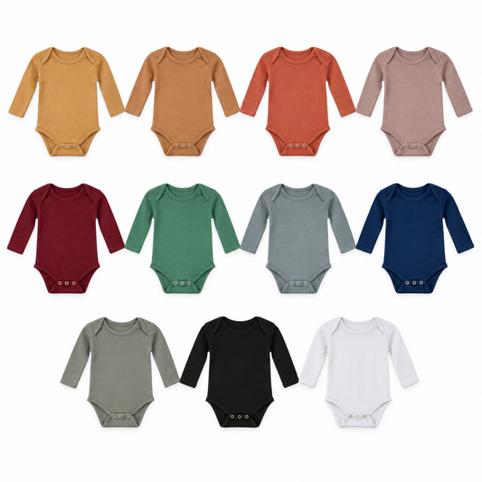 Eleven solid long sleeve baby bodysuit colors at matching scale on white