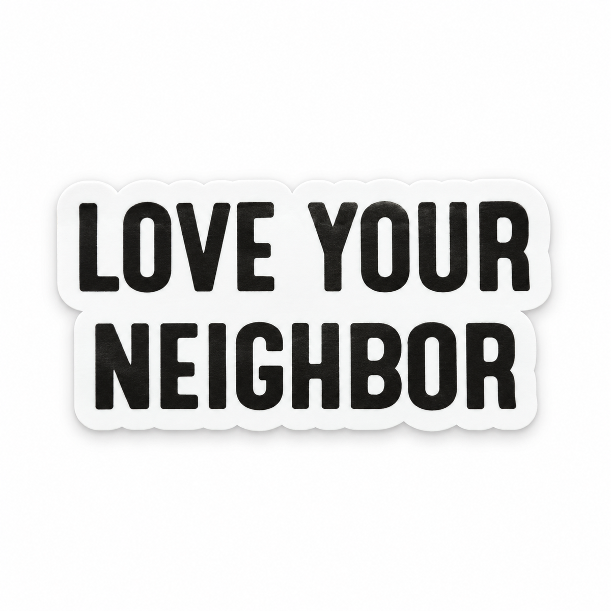 One Love Your Neighbor die-cut sticker, black lettering with a white border.