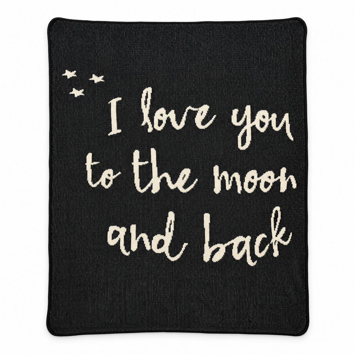 Full view of the black I Love You to the Moon and Back knit blanket with cream lettering and three stars