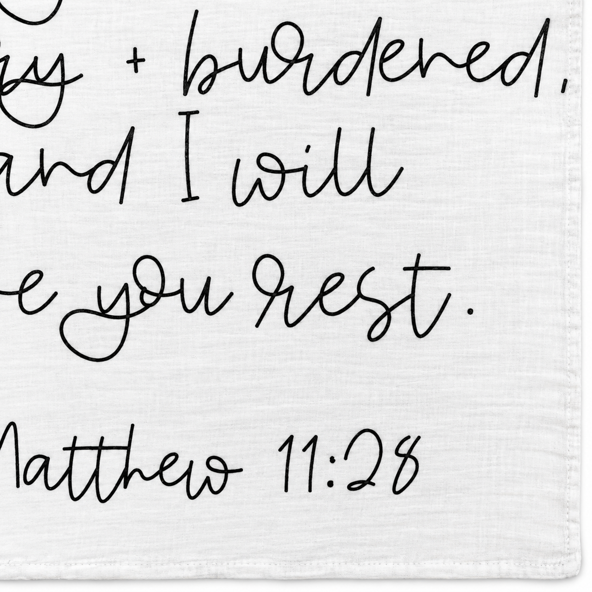 Matthew 11:28 Scripture swaddle detail showing the printed lettering and hem.