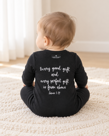 Baby showing the back design of James 1:17 Organic Button Footie; AI-styled product image.