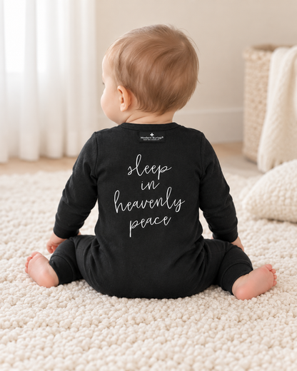 Baby showing the back design of Sleep in Heavenly Peace Organic Button Coverall; AI-styled product image.
