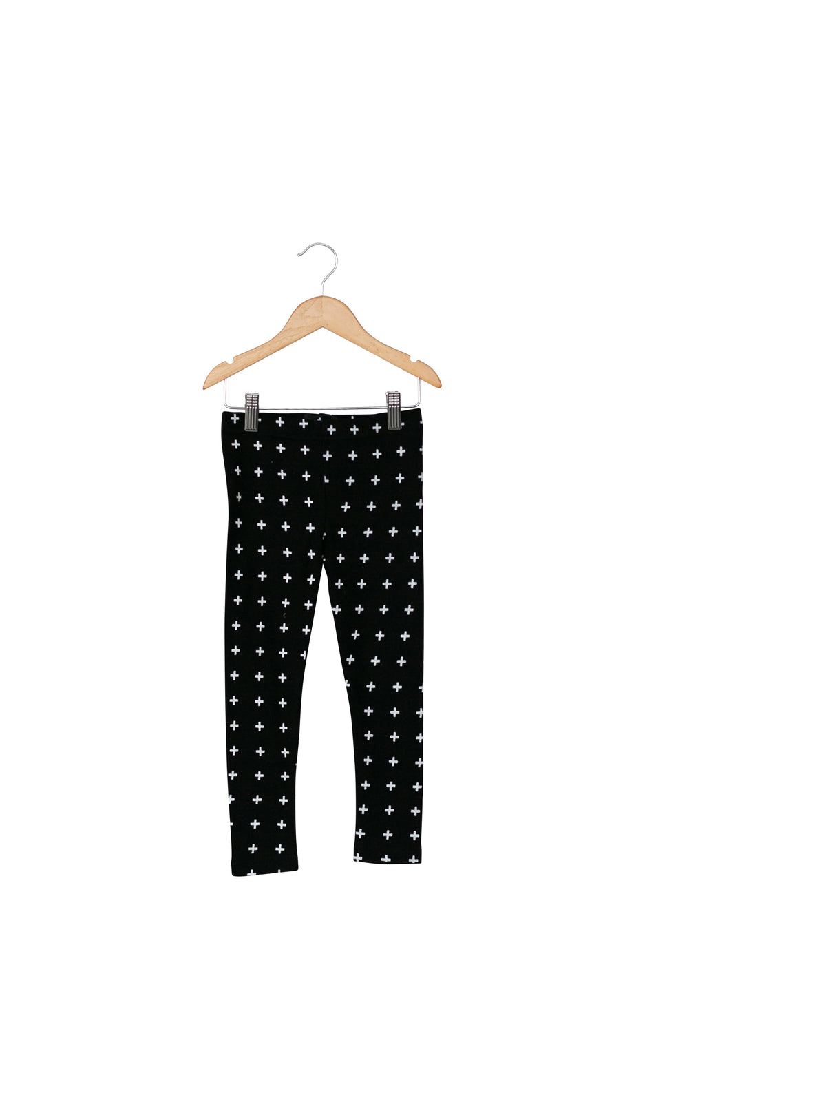 Child styled in Modern Burlap organic cotton leggings in a signature monochrome print