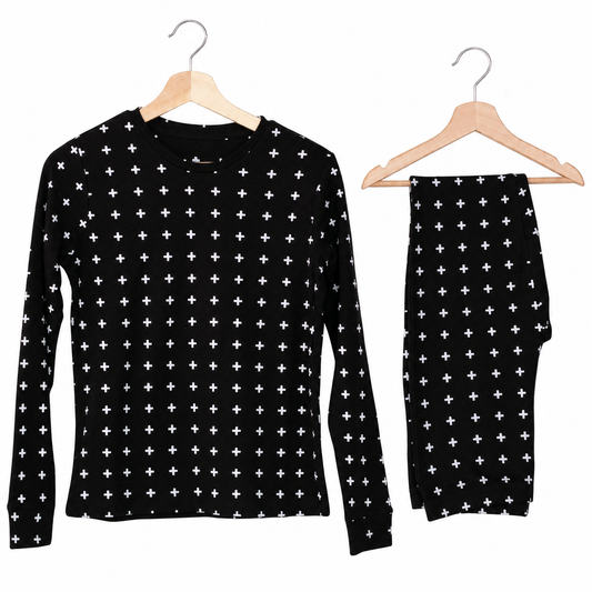 Organic Baby + Kids Pajama Set | White on Black Swiss Cross - top and matching pants on a white background