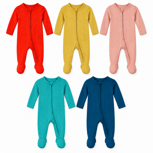 Five equally sized organic zip footies in Cherry Tomato, Mustard, Blooming Dahlia, Arcadia and Sailor Blue on white.