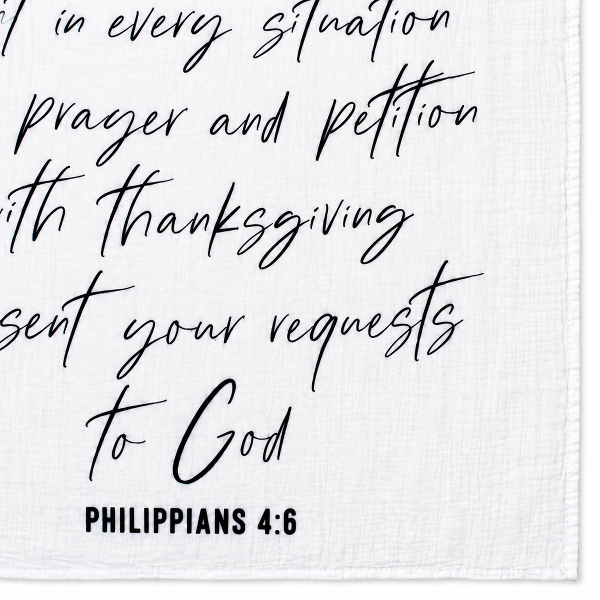 Philippians 4:6 Scripture swaddle detail showing the printed lettering and hem.