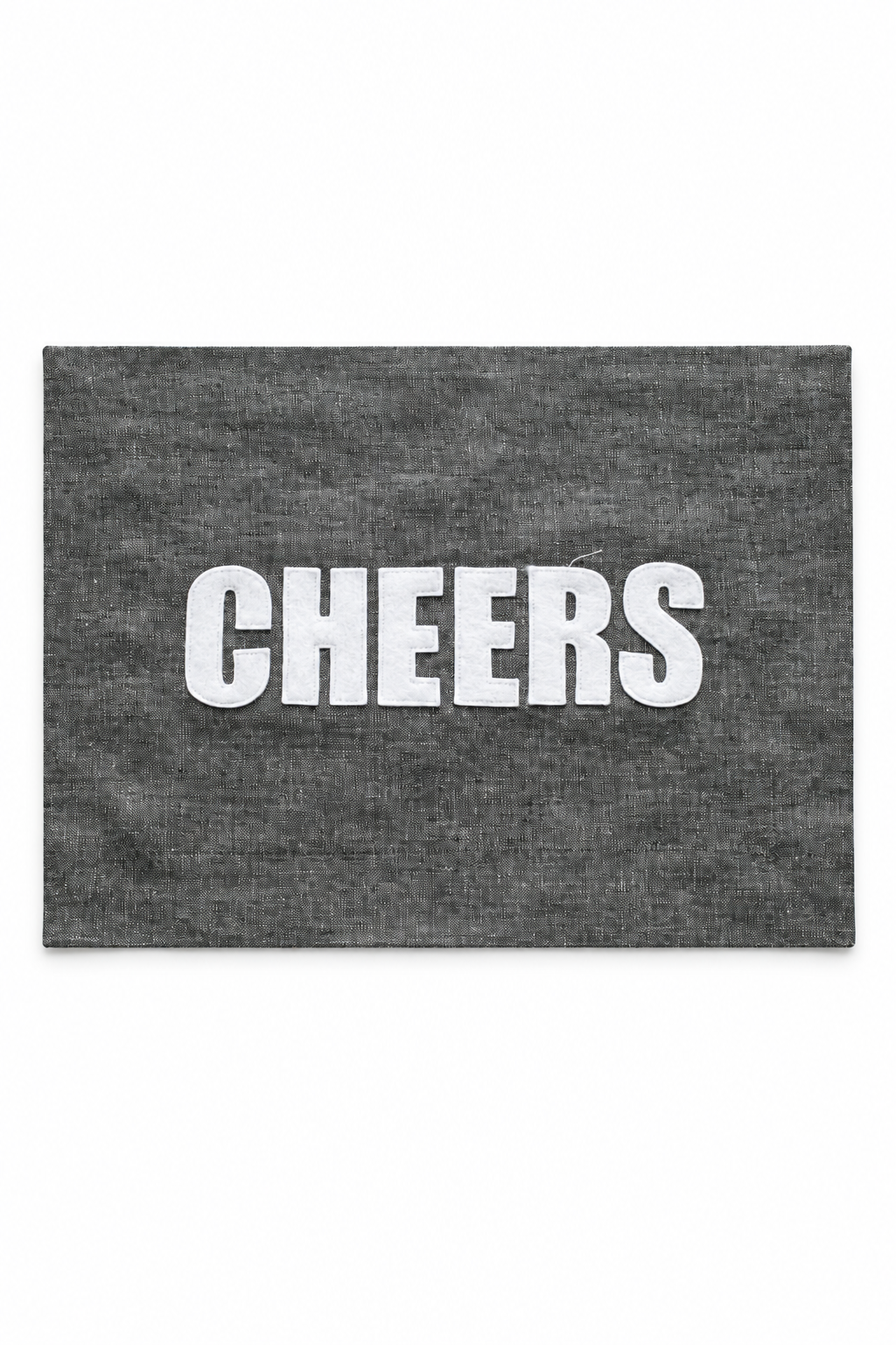 Graphite linen placemat with ivory Cheers lettering. One placemat.