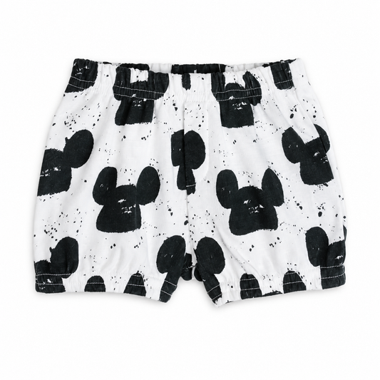 Modern Burlap B+W Modern Mouse organic shorts, front studio view showing the elastic waistband, stitched faux fly and distressed black print.