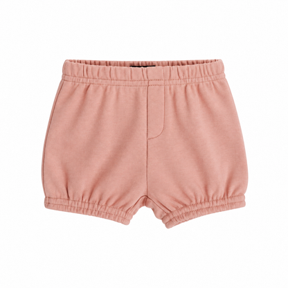 Modern Burlap organic baby and toddler shorts in Blooming Dahlia, front studio view with faux fly and gathered hems on white
