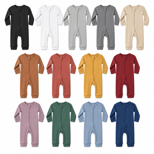 Thirteen solid-color organic zip coveralls at equal scale on white.