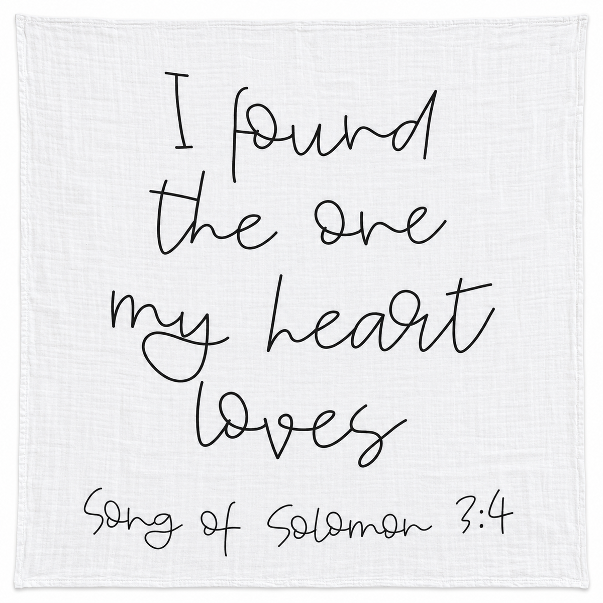 Song of Solomon 3:4 organic cotton muslin swaddle, full black handwritten design on white fabric.