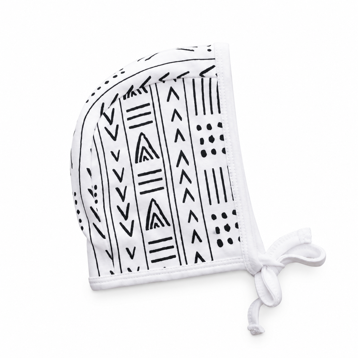 Organic Baby Bonnet | Signature Prints | 0-6 Months / B+W Mud Cloth © — studio product view