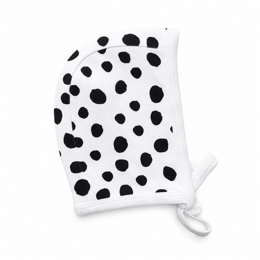 Organic Baby Bonnet | Signature Prints | 0-6 Months / B+W Spots © — studio product view