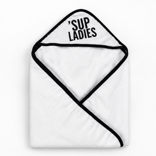 ’Sup Ladies Muslin + Terry Hooded Baby Towel — folded studio view on white