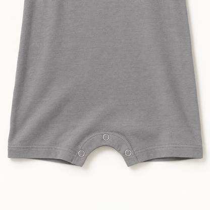 Neutral Gray organic baby tank romper with three-snap closure detail