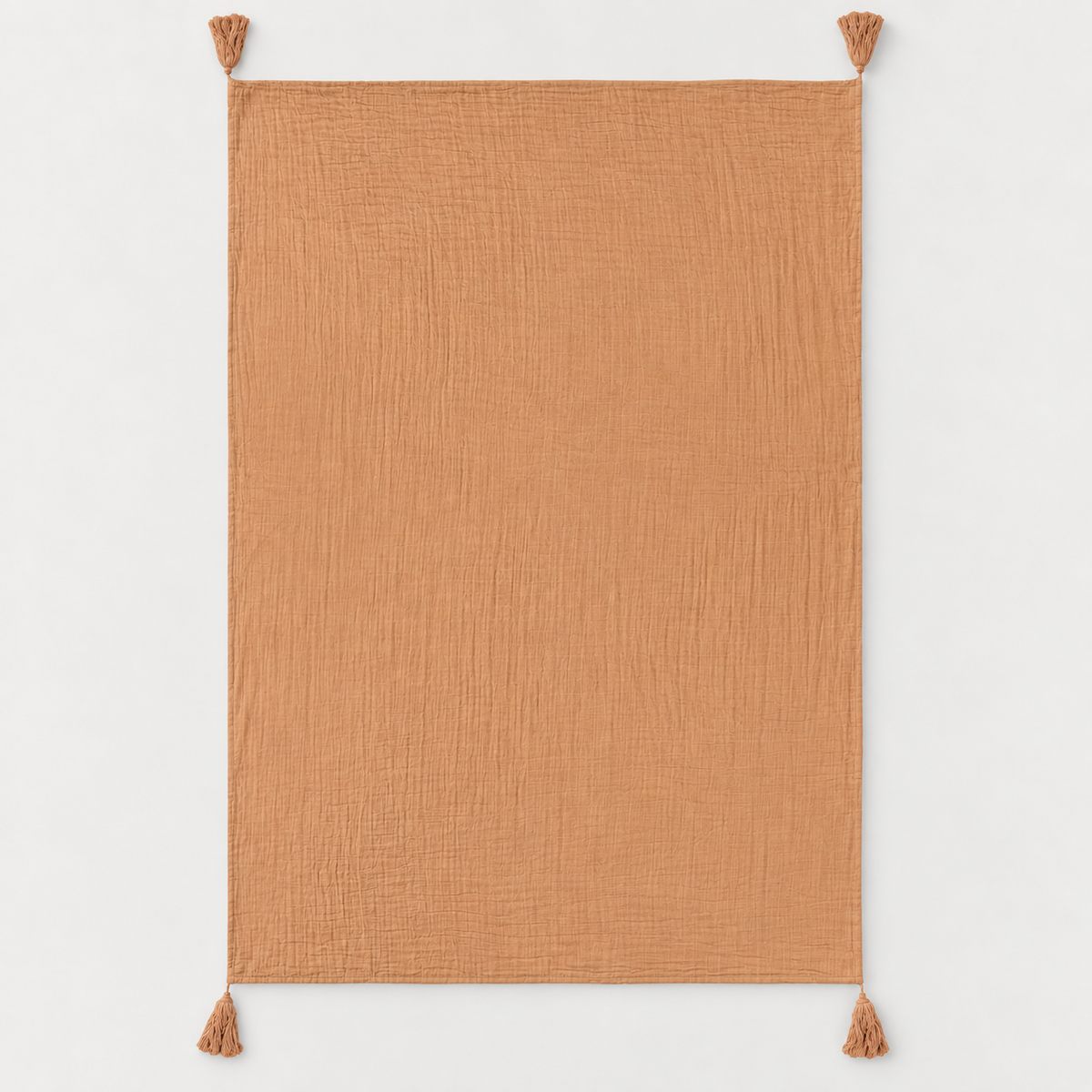 Ginger organic cotton muslin throw fully open with four corner tassels