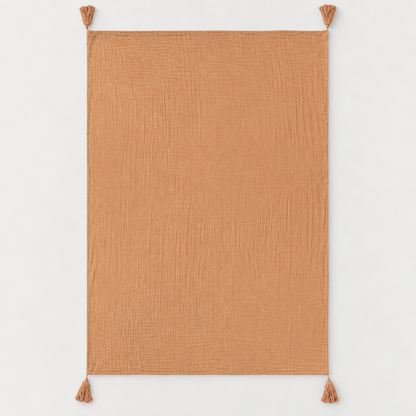 Ginger organic cotton muslin throw fully open with four corner tassels