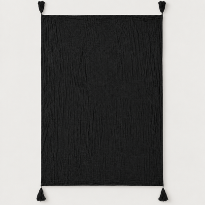 Onyx organic cotton muslin throw fully open with four corner tassels