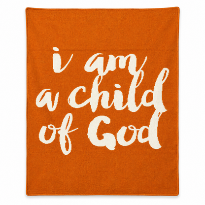 I Am a Child of God Recycled Cotton Throw Blanket — Braza Orange, studio view on white.