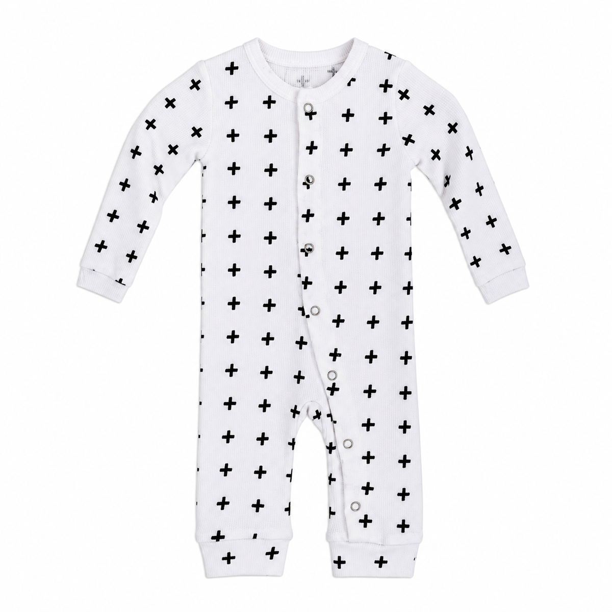 Black-on-white Swiss Cross organic thermal baby coverall, front studio view with snap closure and open ankle cuffs.