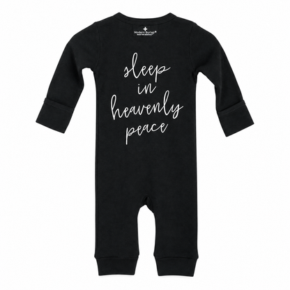 Black Sleep in Heavenly Peace organic button coverall with open feet, back view with white hymn lettering.