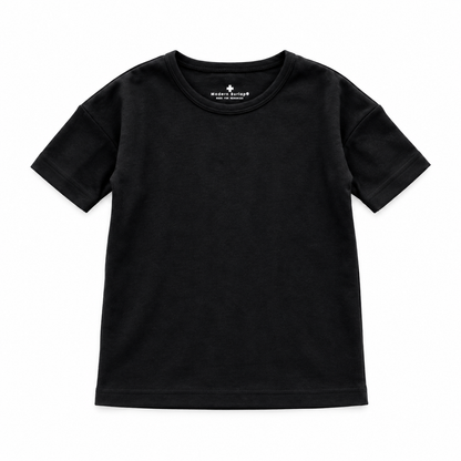 Organic Baby + Kids Slouch Dress in Black, studio product view on white.